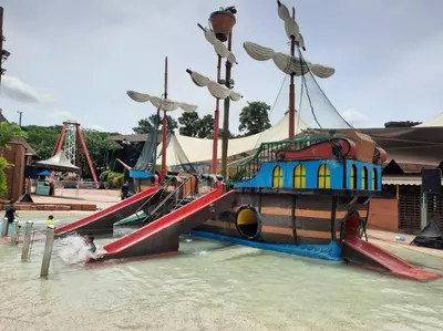 a pirate ship in the water with a slide at Sunway Onsen Studio @ Lost World of Tambun in Ipoh