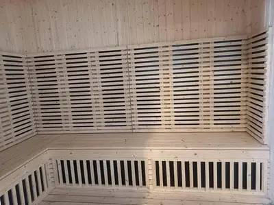 a wooden bench in a room with wooden shutters at Sunway Onsen Theme Park View @Lost World of Tambun in Ipoh