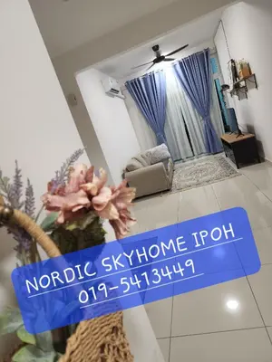 a sign in a room with a living room at NORDIC SKYHOME Ipoh in Kampong Ulu Chepor