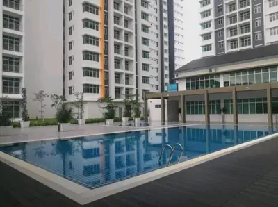 a swimming pool in front of some tall buildings at NORDIC SKYHOME Ipoh in Kampong Ulu Chepor