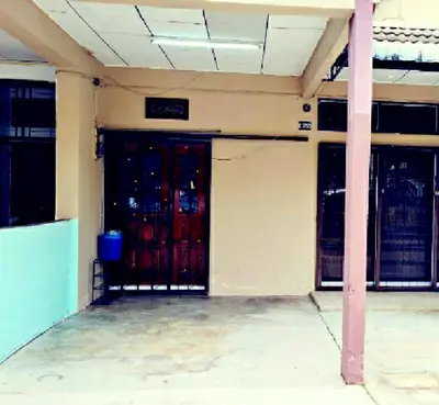 an empty building with two doors and a pole at D'Serina Homestay-3 bedroom 6 bed & free parking in Sungai Petani