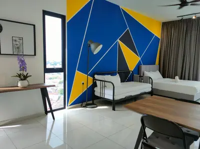 a living room with a large mural on the wall at Beacon Executive Suites 2BR at Georgetown by WL in George Town