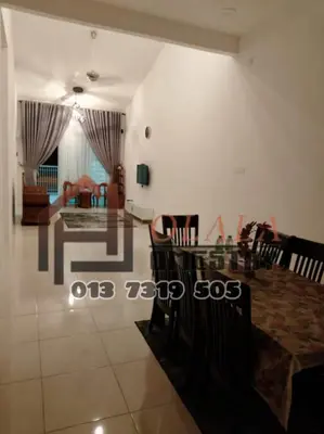 a dining room and living room with a table and chairs at Olala Homestay Tanjung Rambutan Perak in Tanjung Rambutan