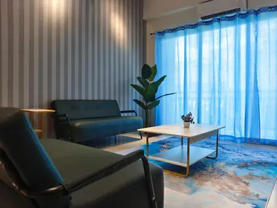 a living room with a couch and a table at Pavilionvillie M1T584 by irainbow in Simpang Pulai