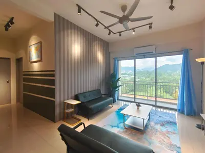 a living room with a couch and a large window at Pavilionvillie M1T584 by irainbow in Simpang Pulai