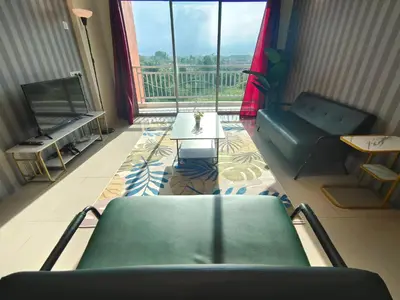 a living room with a couch and a table at Pavilionvillie M1T570 by irainbow in Ipoh
