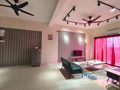 a living room with two ceiling fans and a table at Pavilionvillie M1T570 by irainbow in Ipoh