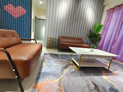 a waiting room with a couch and a table at Pavilionvillie M1T571 by irainbow in Ipoh