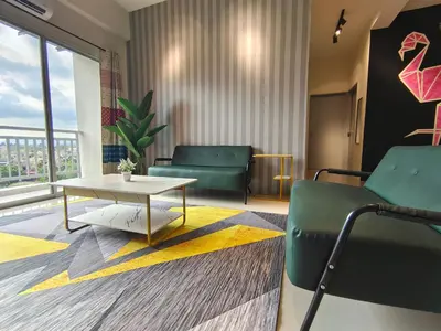 a living room with a table and a couch and a coffee table at Pavilionvillie M1T572 by irainbow in Ipoh