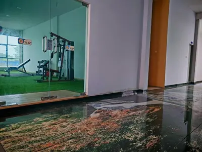 a gym with a glass floor in a room with a gym at Pavilionvillie M1T572 by irainbow in Ipoh