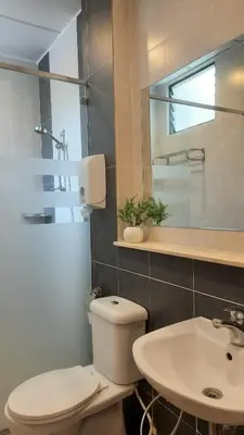 a bathroom with a toilet and a sink at G Residence - 3R2B The Retreat, Aranda Nova, Cameron Highlands in Cameron Highlands