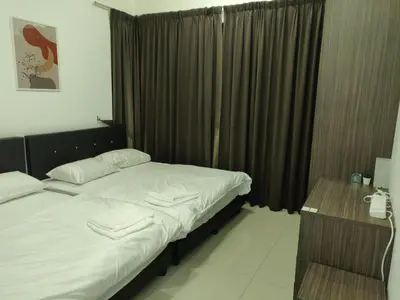 a bedroom with a bed and a window with curtains at Mars Homestay in Kea Farm Brinchang in Brinchang
