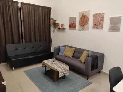 a living room with a couch and a coffee table at Mars Homestay in Kea Farm Brinchang in Brinchang