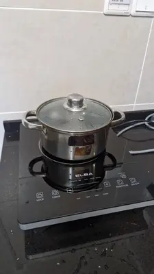 a pot sitting on top of a stove at H&W Sunway Onsen Suite 4-7pax near Lost World of Tambun Ipoh in Ipoh