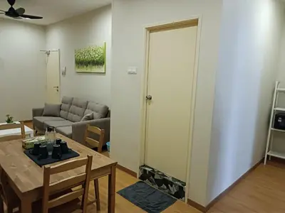a living room with a table and a couch at Only You Boutique Hotel Centrum Cameron Highlands in Brinchang