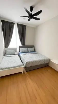 a bedroom with two beds and a ceiling fan at Only You Boutique Hotel Centrum Cameron Highlands in Brinchang