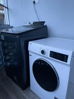 a microwave and a washing machine in a room at GEORGETOWN 18Px 5R4B V KTV & JACCUZI SPA & POOL TABLE NEAR USM & LAM WAH EE HOSPITAL & HAN CHIANG HIGH SCHOOL - kids pool no more in Gelugor