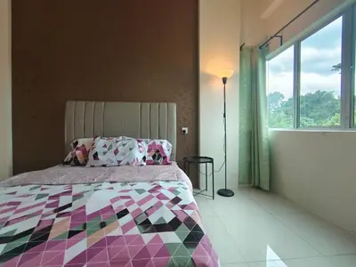 a bedroom with a bed and a large window at Pavilionvillie M1T11 by irainbow in Simpang Pulai