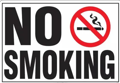 a sign that says no smoking with a no smoking sign at Rent Room in Ipoh