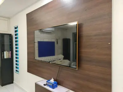 a mirror on a wall in a room at HOMESTAY EPOH MANJOI WITH PRIVATE POOL AND JACUZZI in Ipoh
