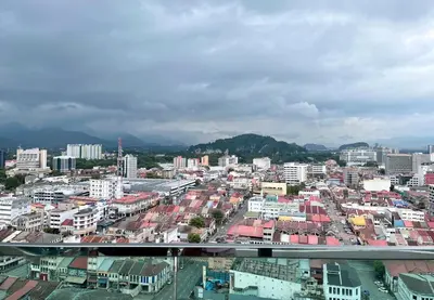 a view of a city with many buildings at One Majestic Ipoh - 3 Bedroom Apt For Family of 5 in Ipoh
