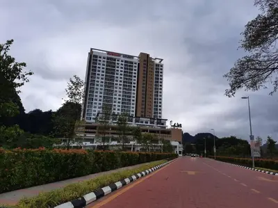 a large building on the side of a road at Onsen Suite at Sunway Lost World Tambun in Ipoh