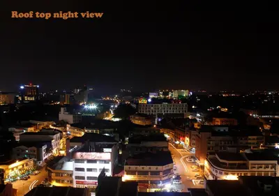 a view of a city at night with lights at H2H - CosyStay @ Majestic Ipoh Town Central in Ipoh