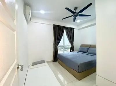 a bedroom with a bed and a ceiling fan at Apartment@Mansion One Georgetown in George Town
