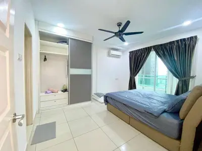 a bedroom with a bed and a ceiling fan at Apartment@Mansion One Georgetown in George Town
