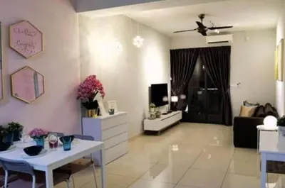 a living room with a white table and a tv at ROMANCE FULL HOUSE THREE PREMIER SUITE in Butterworth