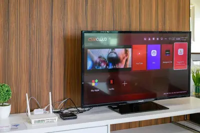 a flat screen tv sitting on top of a table at Comfy Studio/Gurney/Mansion One in George Town