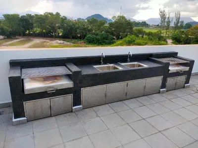 a kitchen with two sinks on a roof at Studio in Sunway Onsen @ Lost World of Tambun for 4 in Ipoh