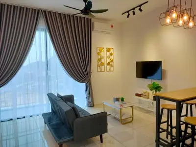 a living room with a couch and a tv at Studio in Sunway Onsen @ Lost World of Tambun for 4 in Ipoh
