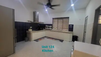 a kitchen with a ceiling fan in a room at Ipoh Family Villa-Spacious Stay for 21 or 42Pax in Ipoh