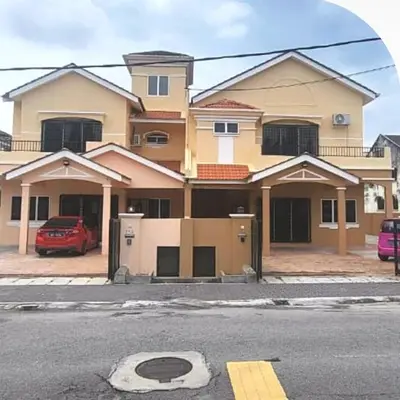a house with a red car parked in front of it at Ipoh Family Villa-Spacious Stay for 21 or 42Pax in Ipoh