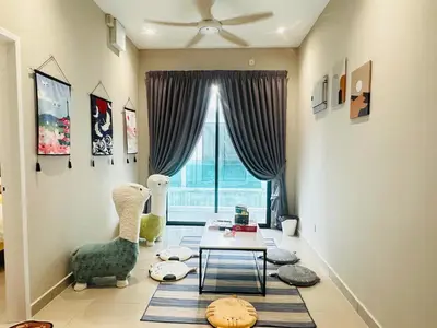 a living room with a table and chairs and a window at \u300aUntitled HomeStay\u300bSitiawan in Sitiawan