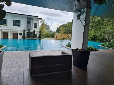 a view of a swimming pool in a house at Sunway Onsen Suite Tambun Ipoh Mountain View in Ipoh