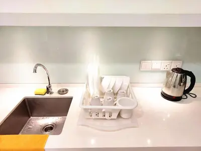 a kitchen counter with a sink and a sink at SG10-4Pax 2rooms Studio Georgetown in George Town