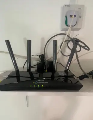 a black computer keyboard with a bunch of wires at Comfy Sutera Seberang Jaya in Kampong Belah Dua
