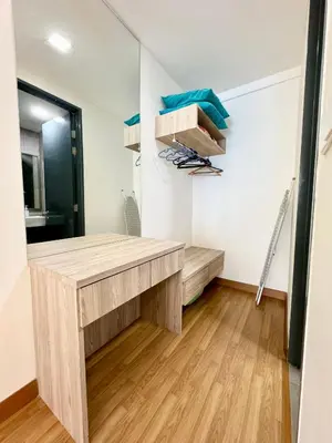 a room with a desk in a room at Tropicana 218 Macalister by CC in George Town