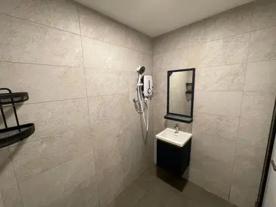 a bathroom with a sink and a phone on the wall at NEW 20PX 5BR V KTV & JACUZZI SPA & POOL TABLE at TOWN CENTER & USM - kids pool no more in Gelugor