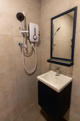 a bathroom with a shower and a sink and a mirror at 15Px 5BR V Jaccuzi Spa n KTV n Pool Table At Georgetown, USM n Lam Wah Ee Hospital -Kids pool no more in Gelugor