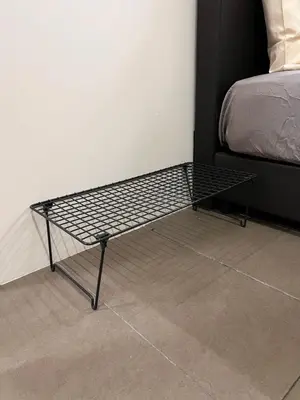 a black metal bench next to a bed at Room2#IG theme Bargainous#Shared Bathroom#4pax#2min Kek Lok Si in Ayer Itam