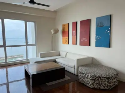 a living room with a couch and a coffee table at Perfect Marina Stay@ Strait Quay 5 pax w/ Free Carpark in Bagan Jermal