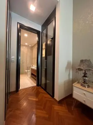 a room with a hallway with a mirror and a bathroom at Perfect Marina Stay@ Strait Quay 5 pax w/ Free Carpark in Bagan Jermal