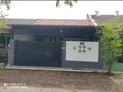 a house with a gate in front of it at Homestay Idaman Private Pool Mslim in Kuala Kangsar