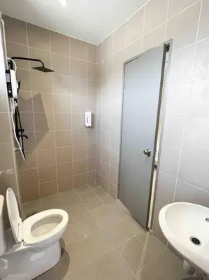 a bathroom with a toilet and a sink at Comfy Sofy 23- Balcony Garden (Night market) in Tanah Rata