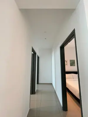 a hallway with two doors leading to a bedroom at METROPOL SERVICED APARTMENT at Bukit Mertajam, Pulau Pinang in Bukit Mertajam