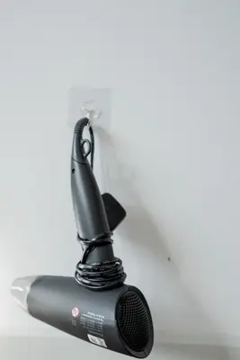 a black microphone sitting on top of a table at Ipoh Tambun Lost World Sunway Onsen Suites Lana 2R2B 8 paxs in Tambun