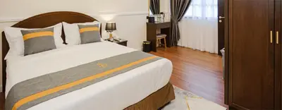 a bedroom with a large bed in a room at SPRINGHILL RESORT in Cameron Highlands